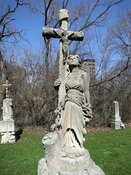 All_Saints_Parish_Cemetery_Chicago_IL_April_22nd_2013_unusual_angel_w_jesus_cross.jpg
